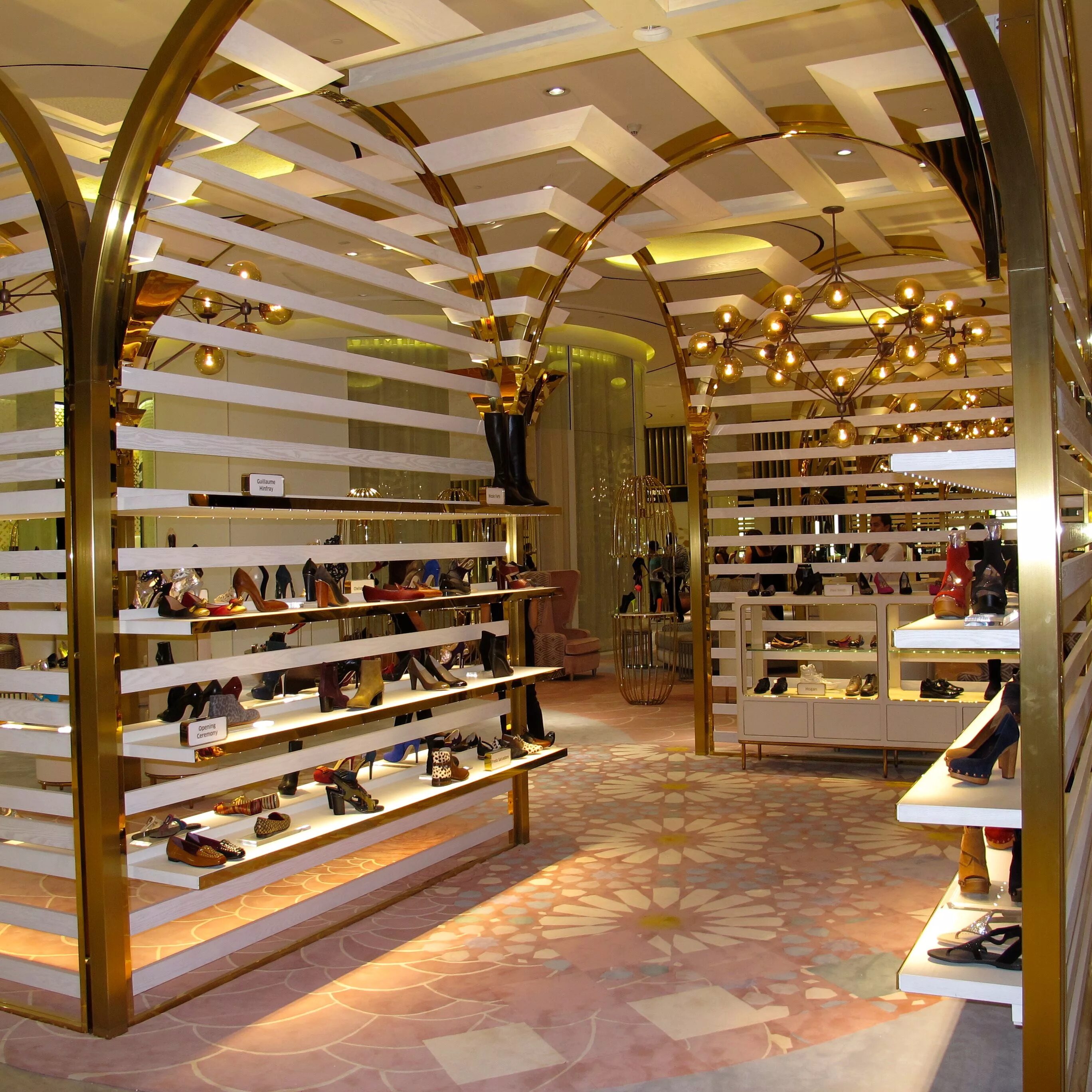 Level store. Level Shoes Dubai Mall. Левел шуз в Дубай Молл. Витрины Дубай Молл. Bearbrick Дубай Молл.