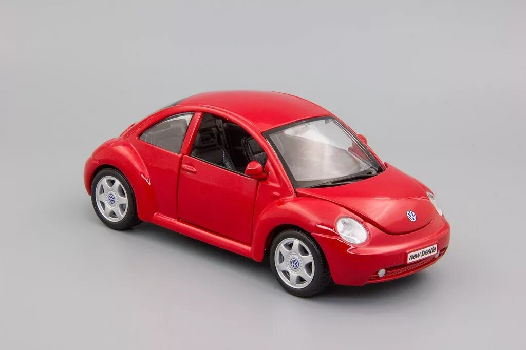 Машинка volkswagen. VW Beetle 1/24. Машинка металлическая Kinsmart 1:24 Volkswagen Beetle New (Жук Рестайлинг). Модель 1.64 Volkswagen Beetle smile. Модель New Beetle.