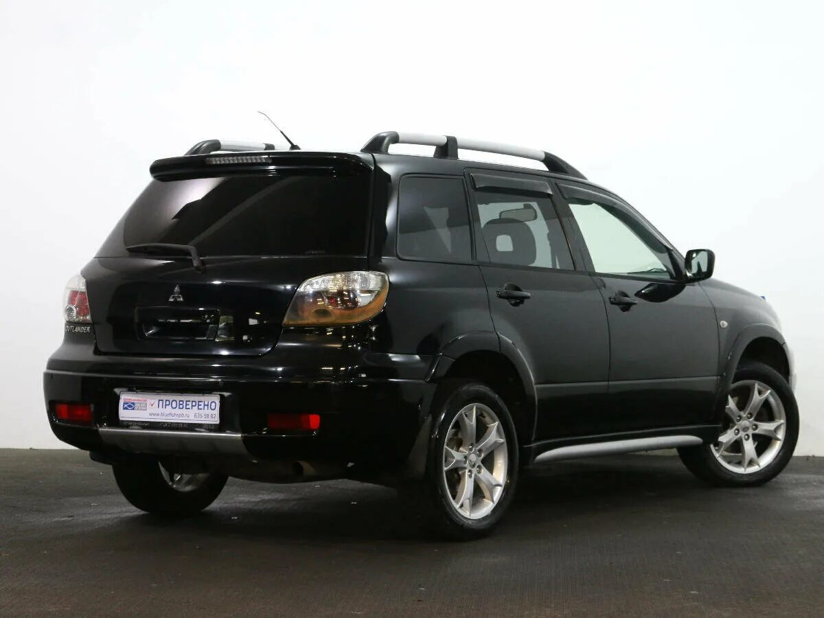 Mitsubishi outlander первое поколение. Mitsubishi Outlander 1 черный. Аутлендер 1 поколения. Mitsubishi Outlander черный 2006. Митсубиси Аутлендер 1 поколения.