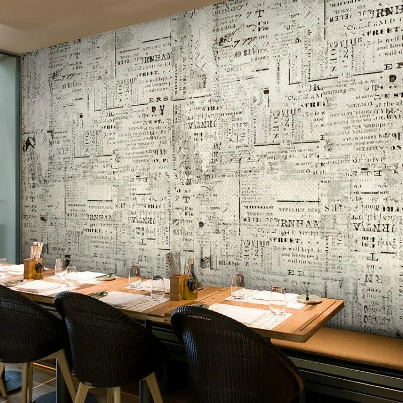 Часы настенные. Обои кирпичики на кухне. Природный камень в интерьере гостиной. Книги обои. Отделка стен в кафе.