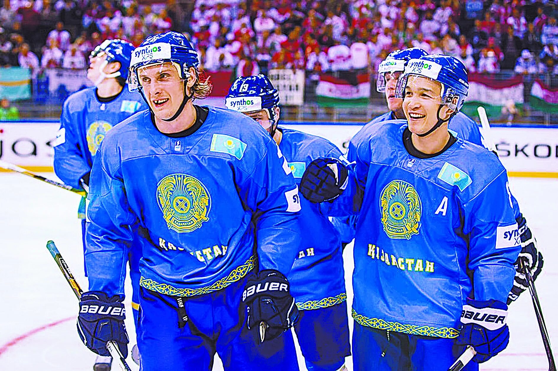 Игрок сборной казахстана по хоккею. Сборная казахстана по хоккею с шайбой. Форма сборной казахстана по хоккею. Хоккейная сборная казахстана. Хоккейные команды казахстана.