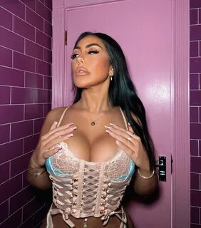 Sophie Kasaei leaves little to the imagination in a busty snap. 