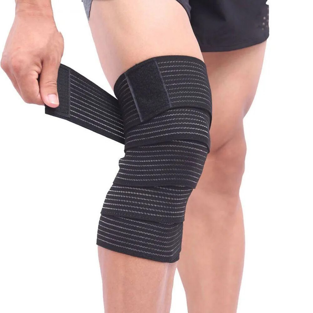 Эластик бинт для колен. MADMAX бинты для коленей Elastic Knee Bandage. Бинт наколенник 7709. Фиксация колена бинтом.