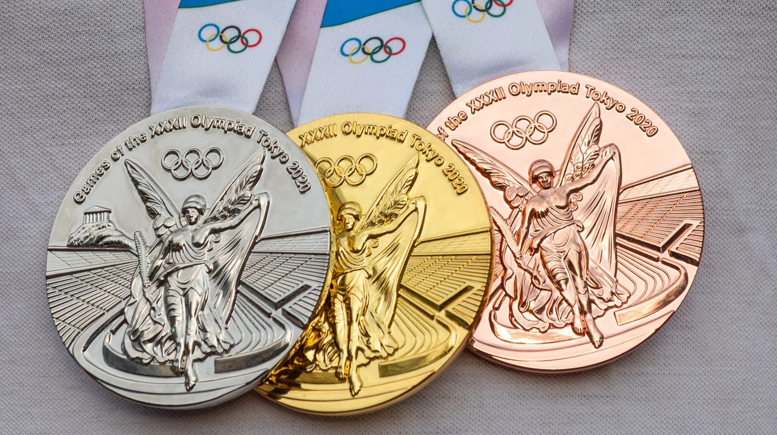 Самое большое количество олимпийских медалей. Медали ОИ 2021 Токио. Медаль Олимпийских игр в Токио. Медали олимпиады в Токио 2021. Летние Олимпийские игры 2020 в Токио медали.