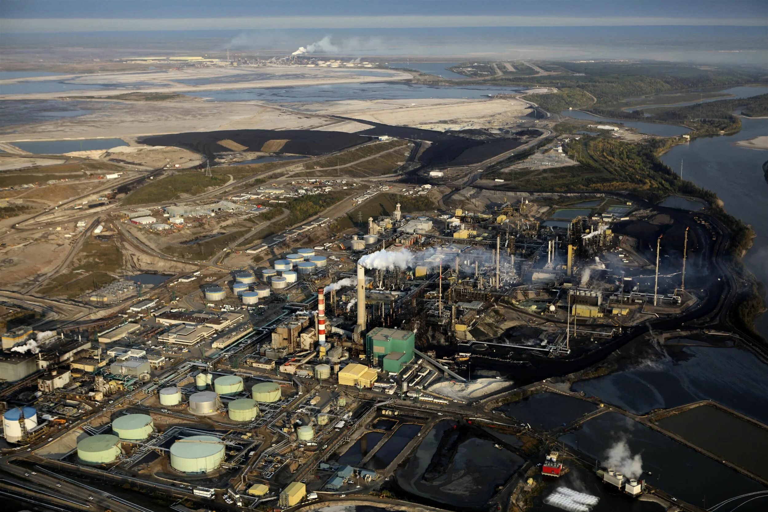 Экологические проблемы нефтяной и газовой промышленности. Нефтеносные Пески Канады. Атабаска месторождение нефти.