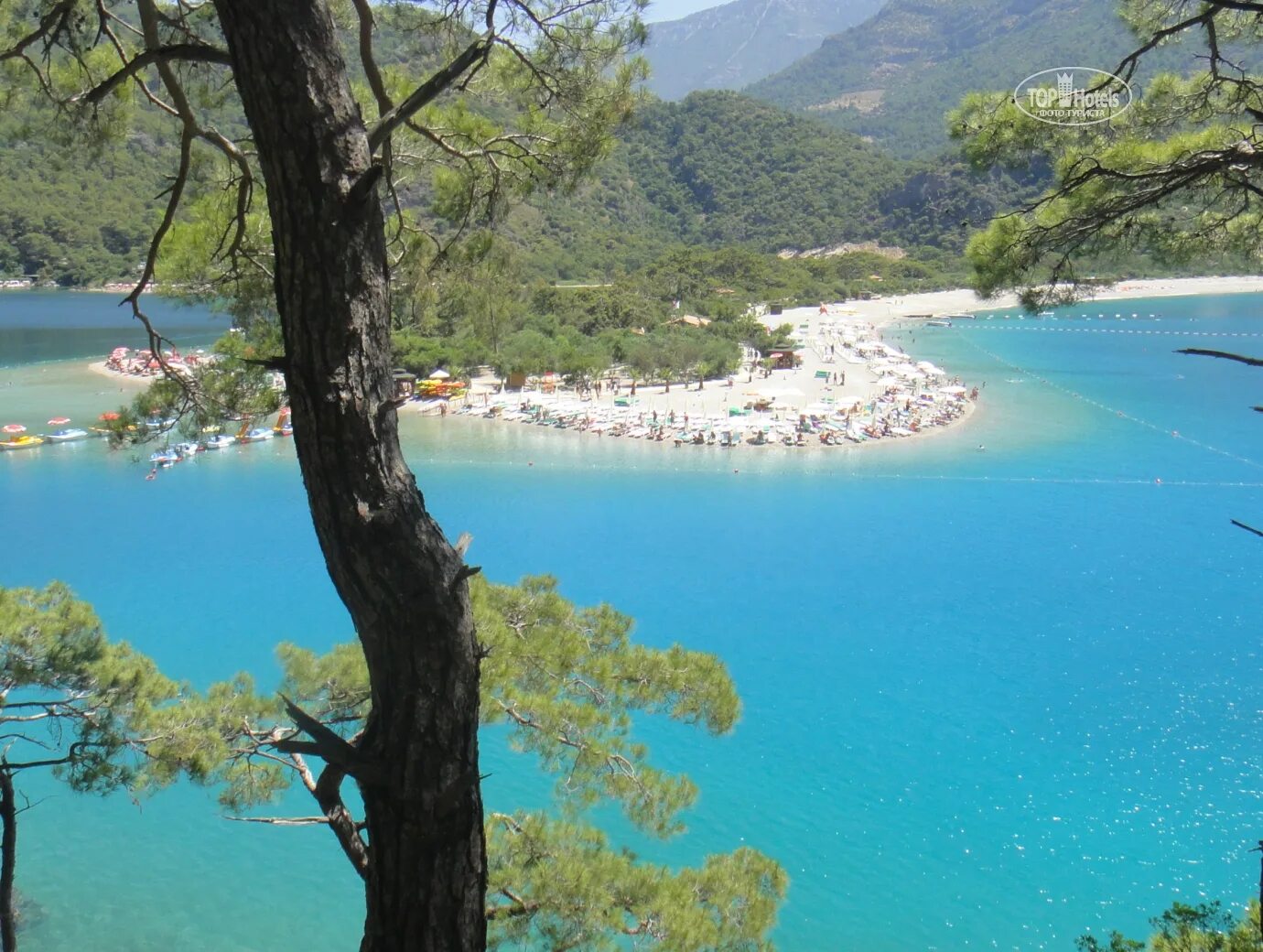 Akdeniz beach 3. Голубая Лагуна Фетхие Турция. Фетхие Олюдениз. Олюдениз голубая Лагуна. Голубая Лагуна — заповедник в Олюдениз, Турция.