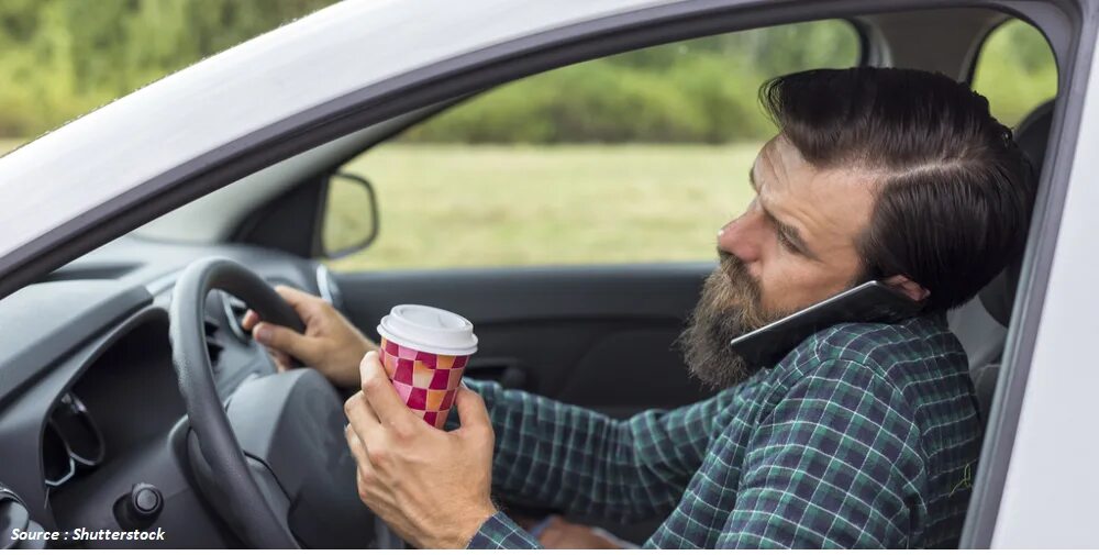 A driver is in the car