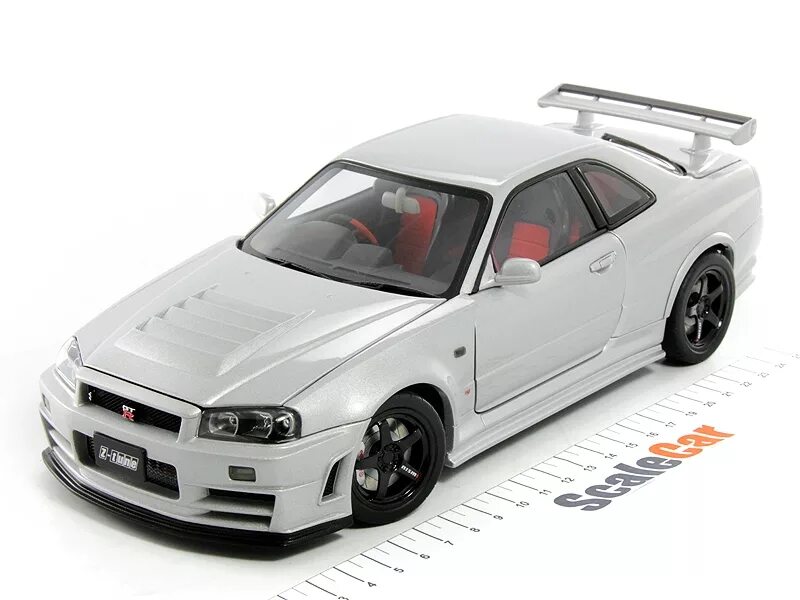 Nissan GTR r34 моделька. Nissan 1 18. Модель Nissan gt-r 1:18. Nissan Skyline r34 моделька. Модели автомобилей на авито