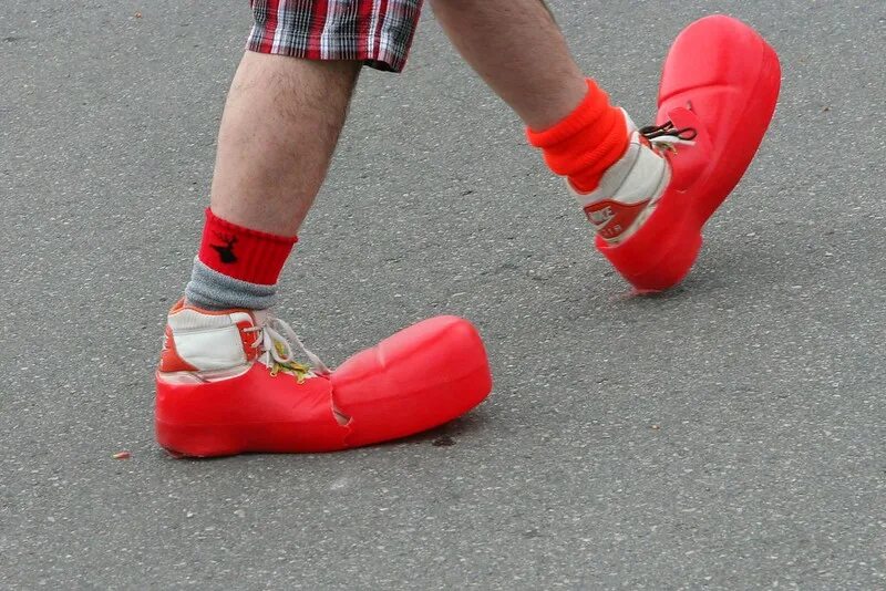 Shoes too tight. Too big shoes. big shoes to fill. big red shoe. shoes are too small.