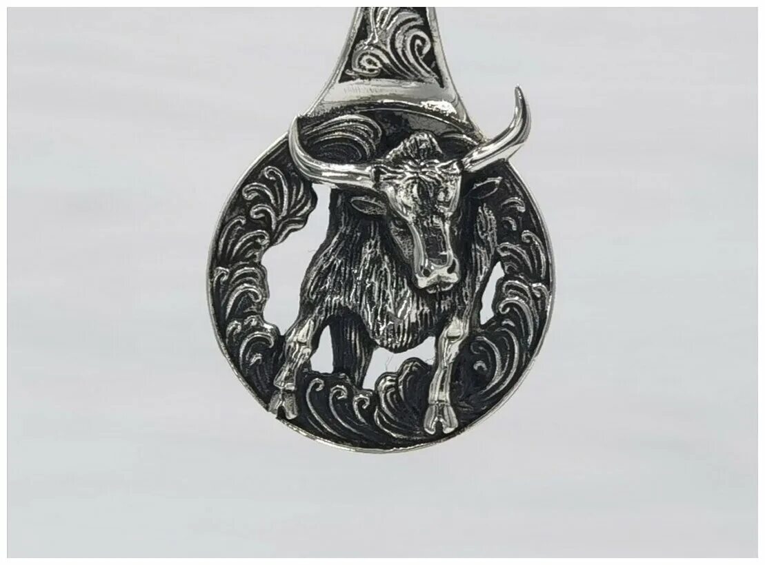 бык тотем шаманизм. туристический талисман. тотем тур. индейский тотем быка. златорогий тур амулет.