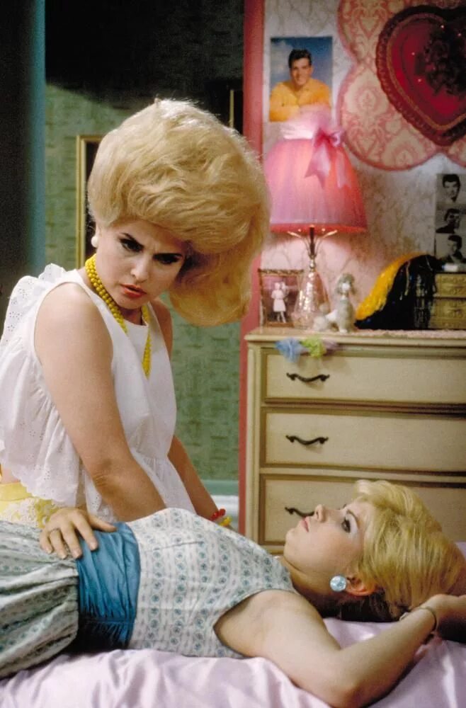 Jim uses a lot of hairspray. Hairspray 1988.