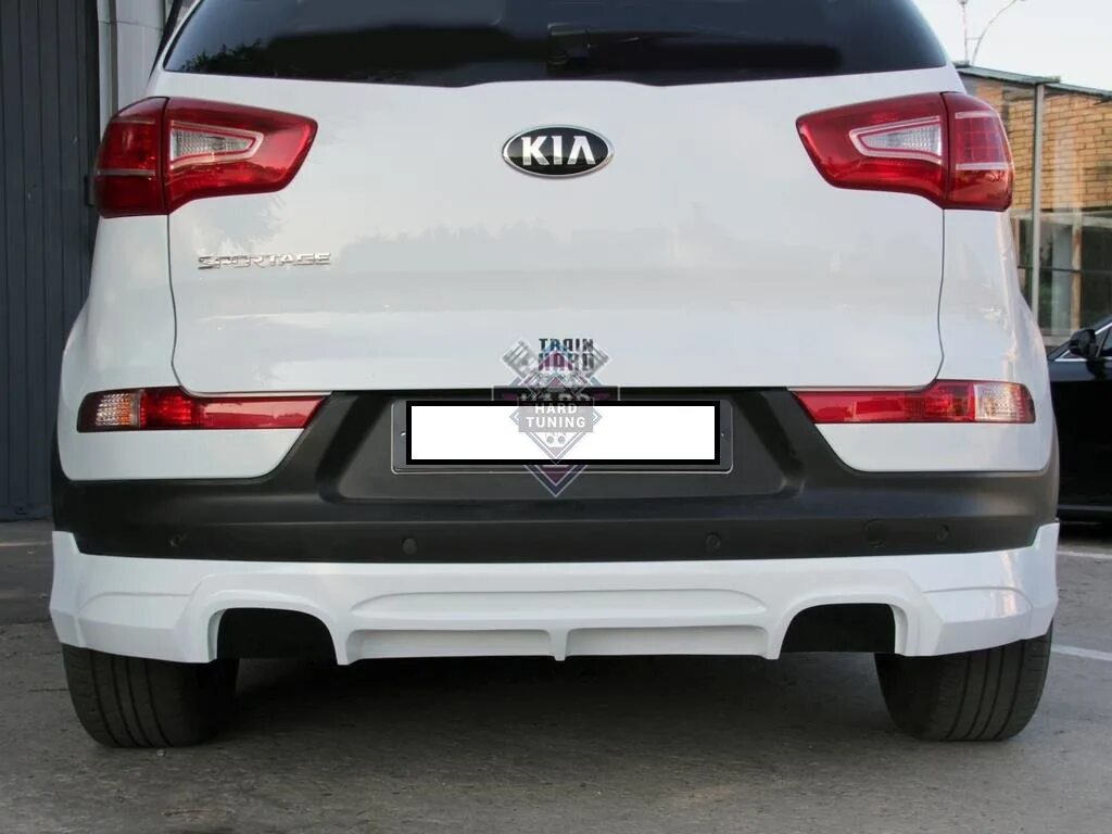 Задний бампер спортейдж 3. Обвес JSW на Kia Sportage 3. Kia Sportage 3 задняя накладка. Kia Sportage 3 накладки на бампер. Накладка на задний бампер Киа Спортейдж 3.