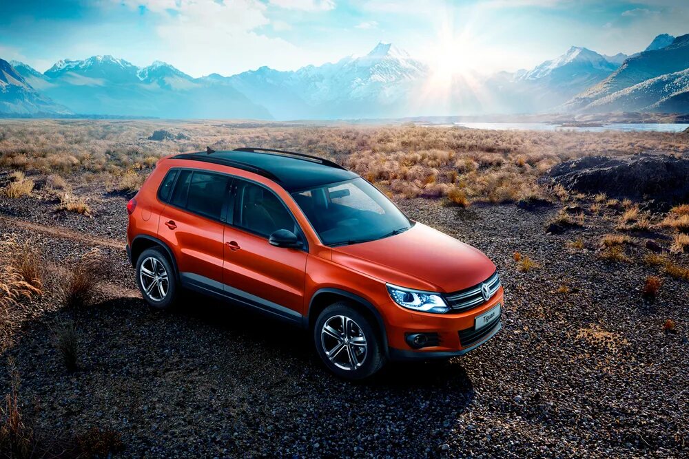 Volkswagen модель tiguan. VW Tiguan. Volkswagen Tiguan оранжевый. Фольксваген Тигуан 2016 красный. Tiguan 1.