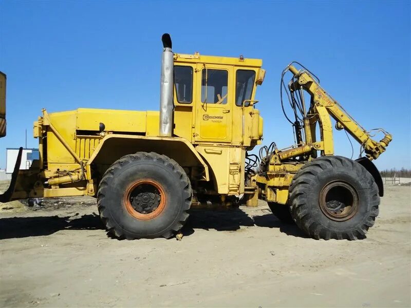 к703маос2 хл. тсм новый уренгой. переезд новый уренгой. спецтехника уренгой. кировец ас с манипулятором.