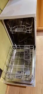 Посудомойка с вертикальной загрузкой