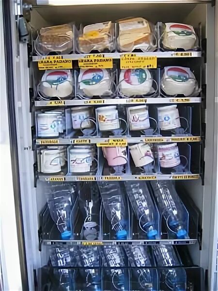 Продукция для аппаратов. Автомат продажи молочных продуктов. Вендинговые аппараты охлаждаемые. Автомат для морозильной камеры. Аппарат для продажи молока.