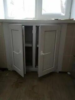 Шкаф под окном