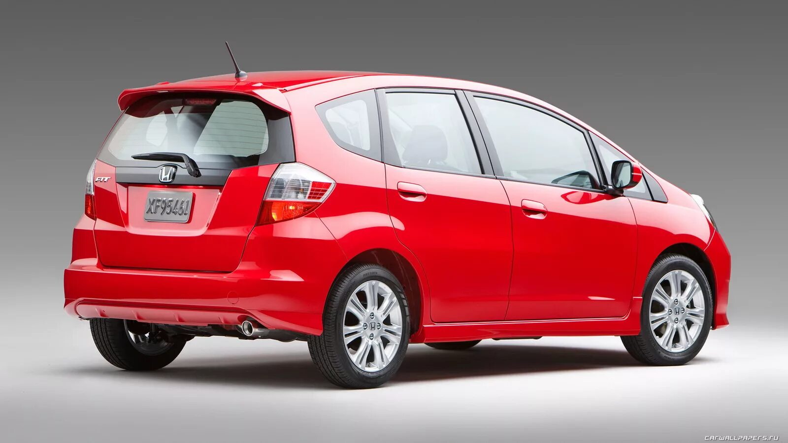 машины хонда тойота. Odyssey elite машина. минивэн хонда одиссей 2014. Honda fit 2009. Honda fit hybrid 2009.