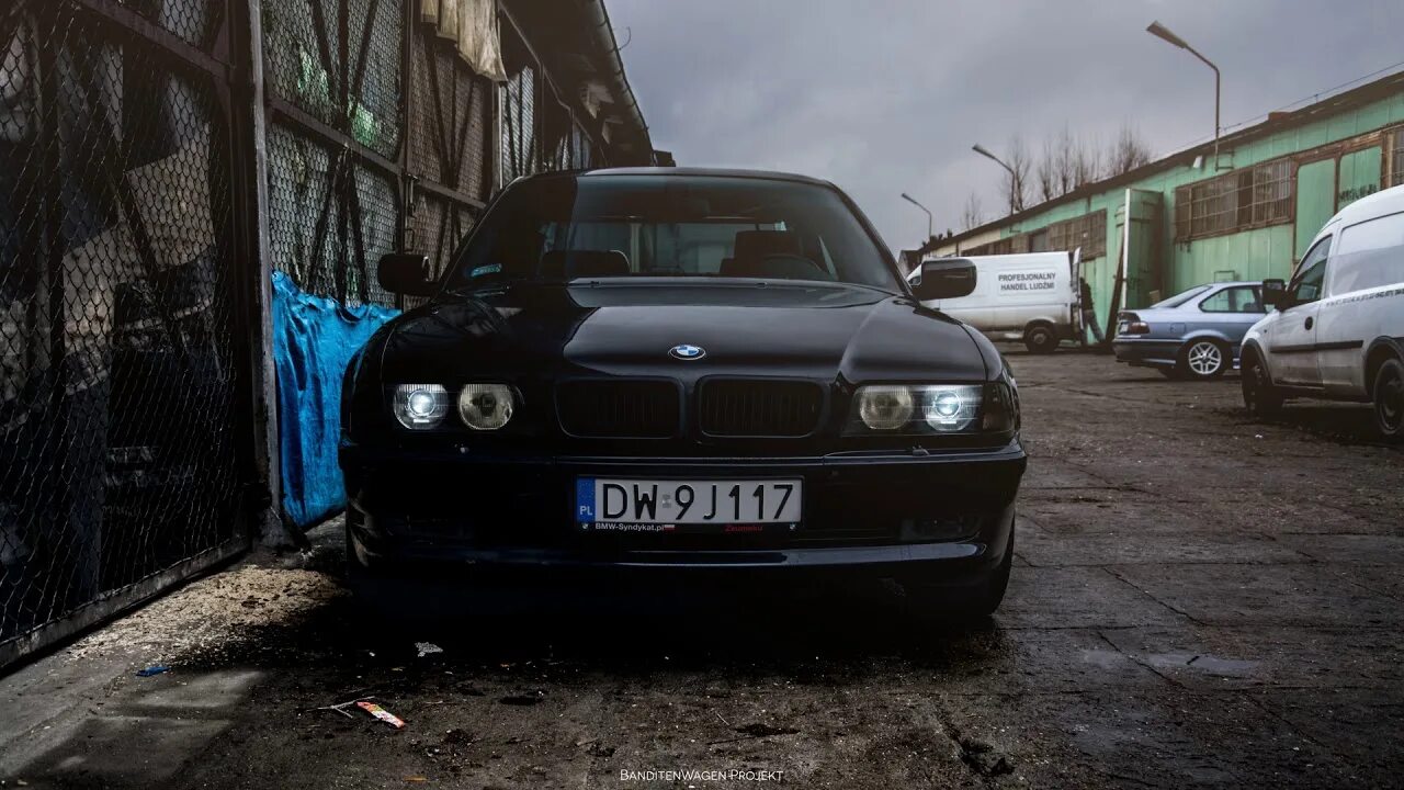 Фото бумера. BMW i750 бумер. БМВ е38 из бумера. Е38 бумер фильм. Бумер БМВ е38 черный лето.