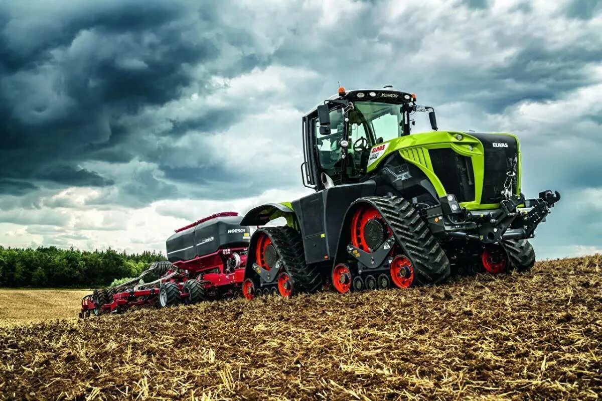 Сх про. Трактор CLAAS Xerion. Ксерион 5000. Трактор CLAAS Xerion новый. CLAAS Xerion комбайн.