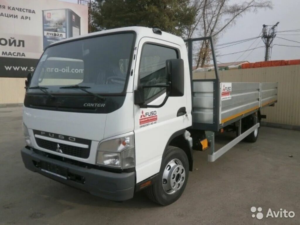 Mitsubishi бортовой. Mitsubishi Fuso Canter бортовой. Fuso Canter бортовой. Fuso Canter Euro 4. Mitsubishi Fuso грузовой бортовой.