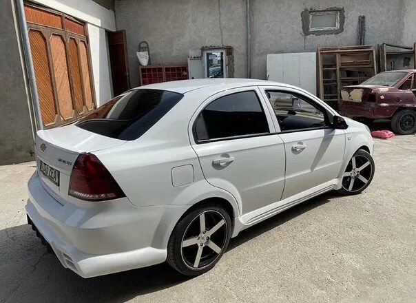 Uzb 3. Нексия 3 Tuning. Chevrolet Nexia 3 Tuning. Обвесы Nexia r3. Nexia 3 белый Tuning.