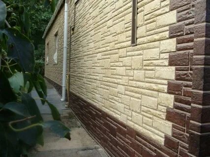 Отделка фасада декоративными панелями под кирпич
