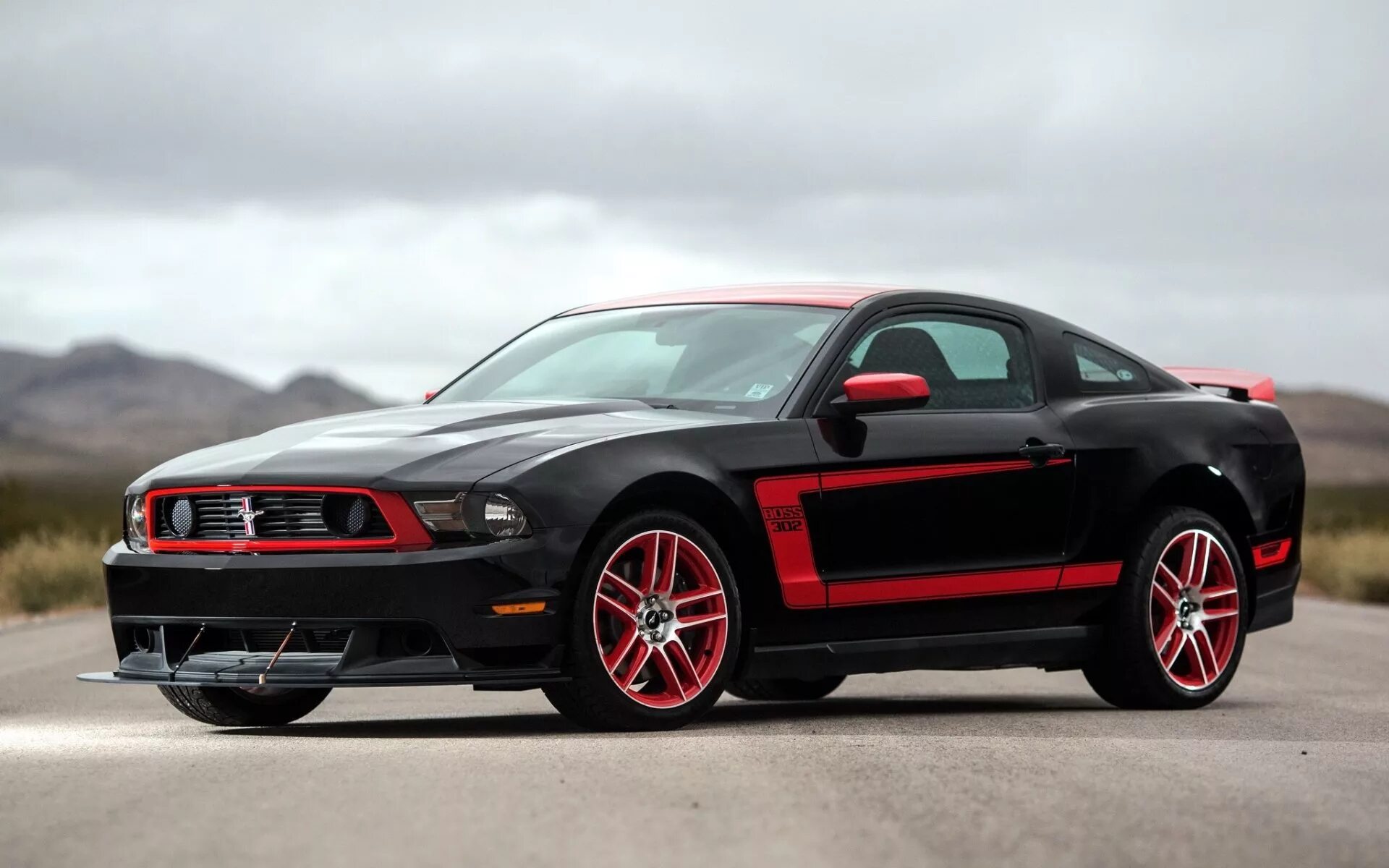 Мустанг производитель. Ford Mustang Boss 302 Black. Ford Mustang Boss 302 2012. Ford Mustang Boss 302 Laguna Seca. Ford Mustang Boss 302 2015.