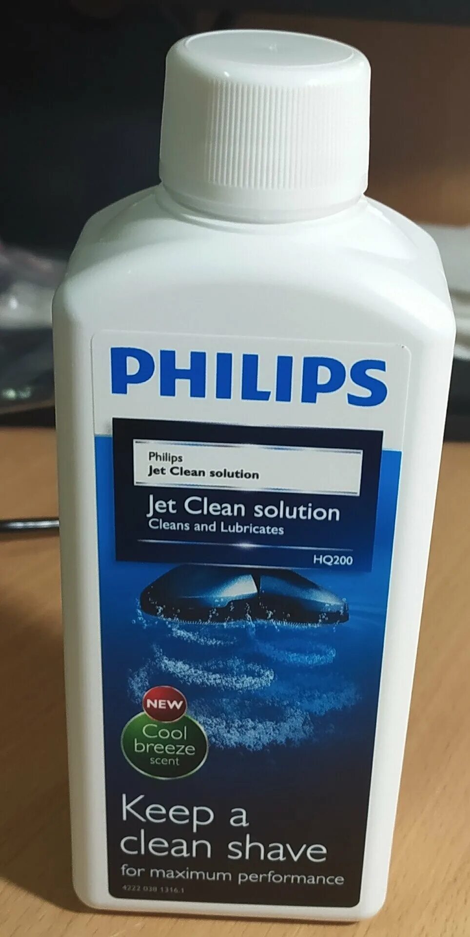 Жидкость philips. Жидкость для бритв philips hq200/50. Жидкость для бритвы philips 7000. Жидкость для чистки бритвенных головок philips hq200/50. Жидкость для очистки бритвы филипс 7000.