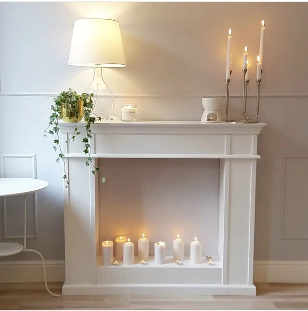 Камин свечка. Фальш камин. Камин имитация. Камин со свечами. Свечки для камина в интерьере.