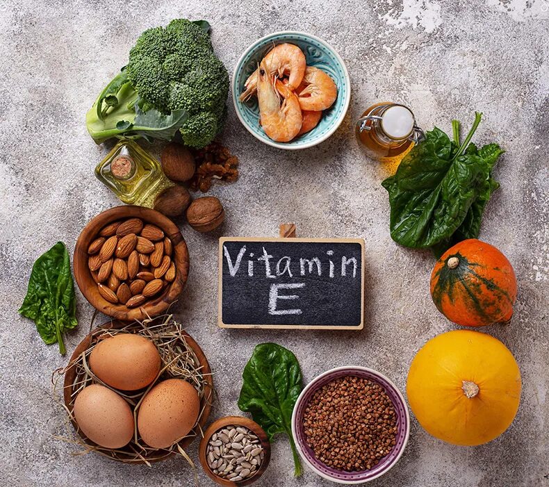Какие продукты являются источником витамина е. Витамин e. Витамин е источники витамина. Пищевые источники витамина е. Источник витамина е в продуктах.