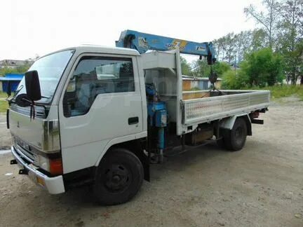 Митсубиси грузовик в иркутской. 5 тонник. Кантер благовещенске. Mitsubishi canter эвакуатор. Исудзу 2015.