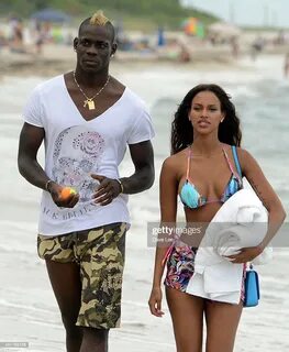 Mario Balotelli and Fanny Neguesha are seen on the beach in Miami... News Photo 