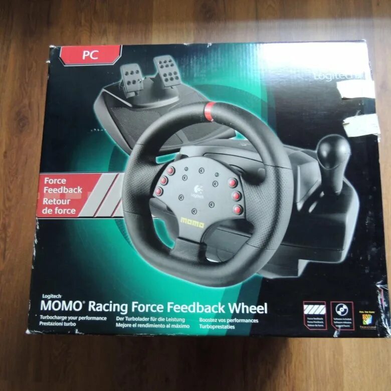 Momo racing force. Игровой руль Momo Racing. Руль игровой Logitech Momo Racing Force feedback. Logitech Momo Racing Force feedback Wheel. Logitech Momo Racing коробка.