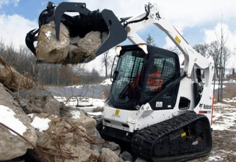 Bobcat вес. Бобкэт t650. Бобкэт 650. Бобкэт т590. Погрузчик Bobcat т650.