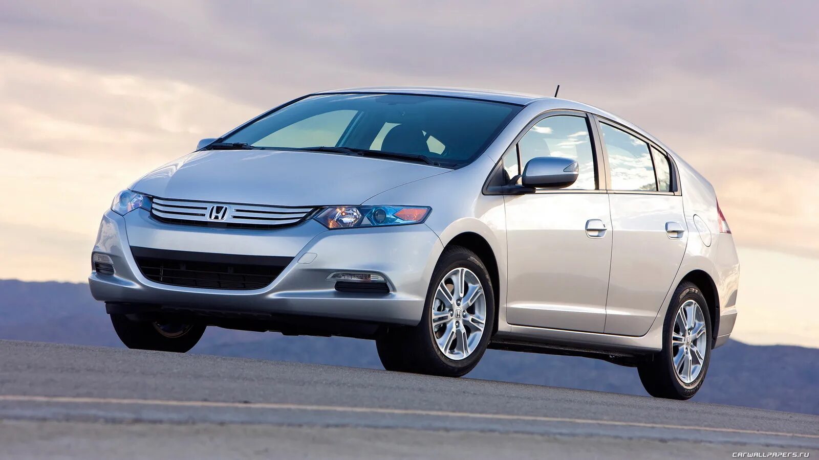 Инсайт года. Хонда Инсайт 2010. Honda Insight 2009. Хонда Инсайт 2. Honda Insight 2010 года.