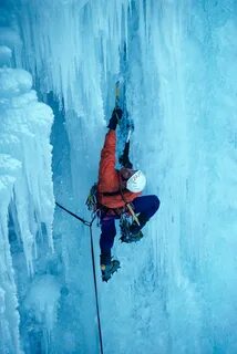 To ascend the route, the ice climber uses specialist equipment, particularl...