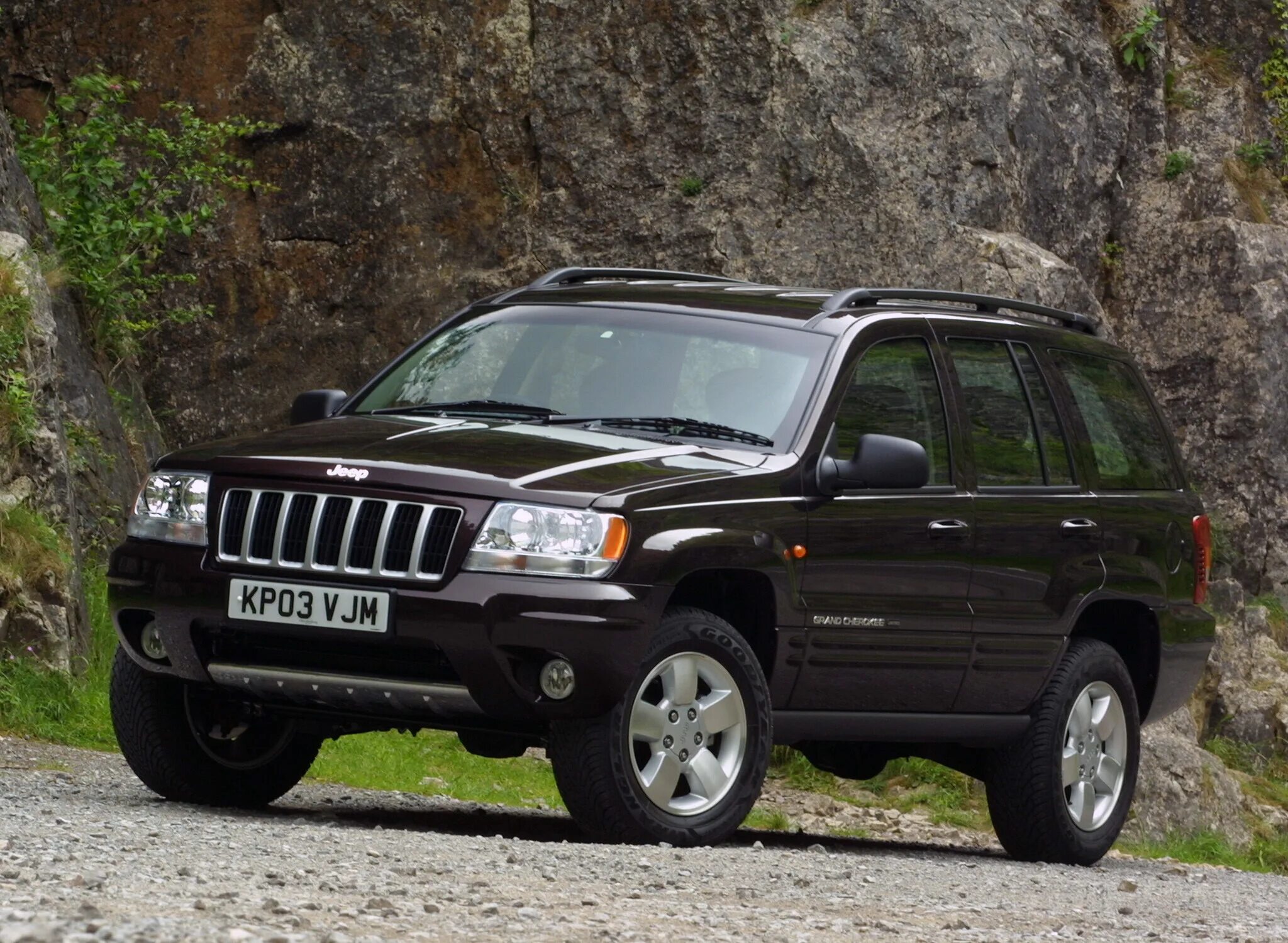 Внедорожники 2000 года. Jeep Grand Cherokee 2003. Jeep Grand Cherokee WJ 2004. Гранд Чероки 2003 WJ. Jeep Grand Cherokee 2000 2005.