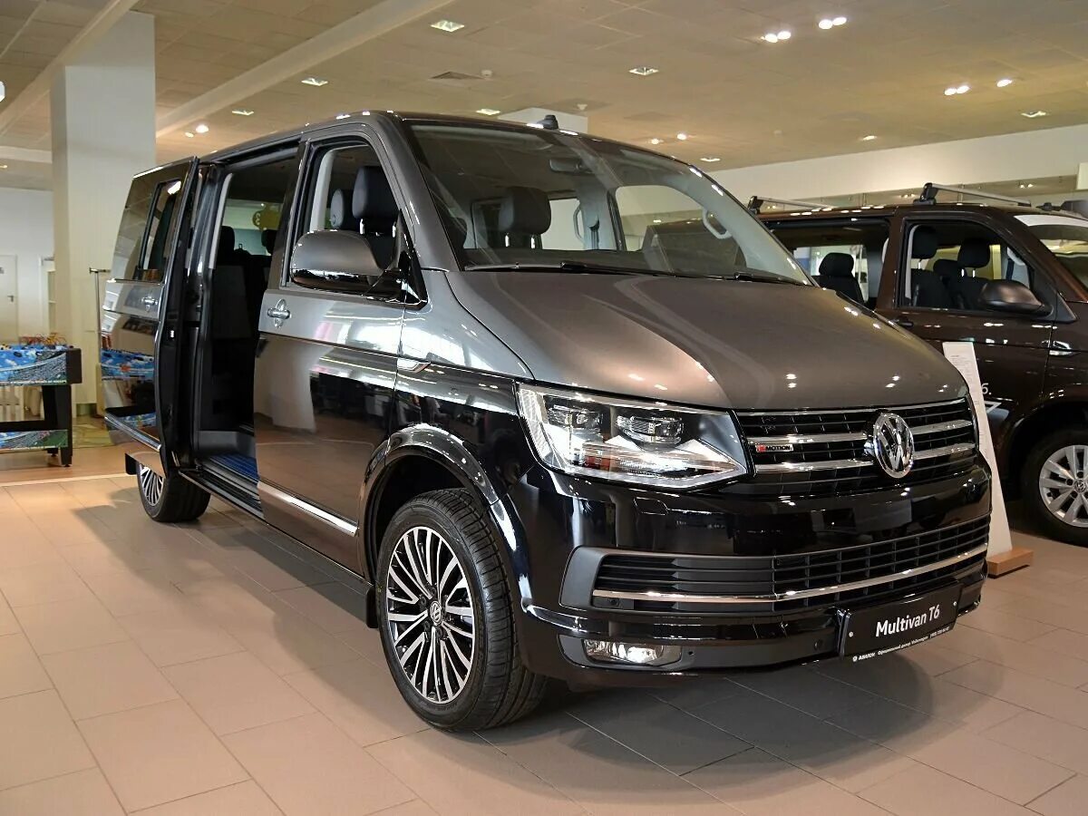 Фольксваген транспортер новый купить. Volkswagen Multivan t6 Black. Фольксваген Каравелла т6 2021. Фольксваген Мультивен т7. Фольксваген Мультивен 2022.