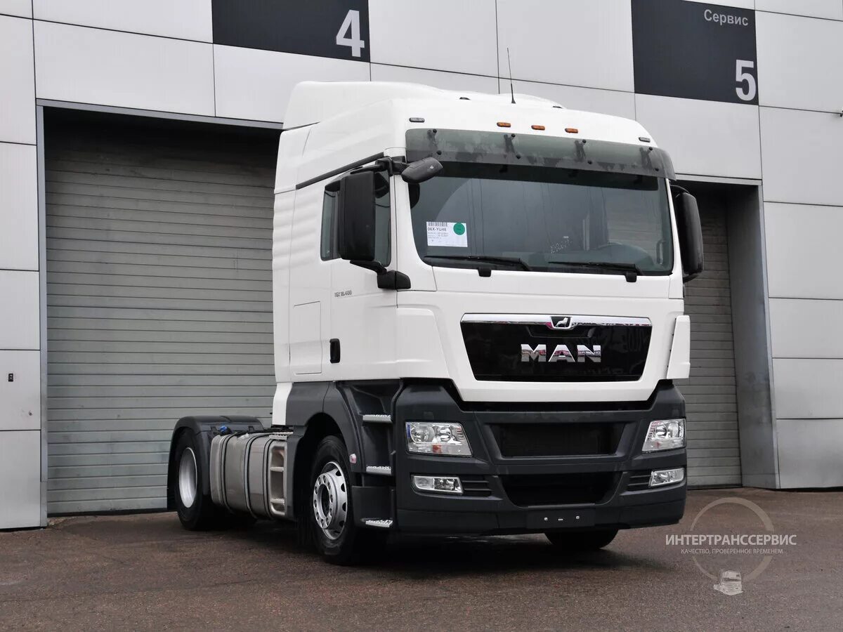 Ман тгх белый новый. Ман тгх белый. Ман тгх зеленый. Man tgx 18400. Man tgx 18.