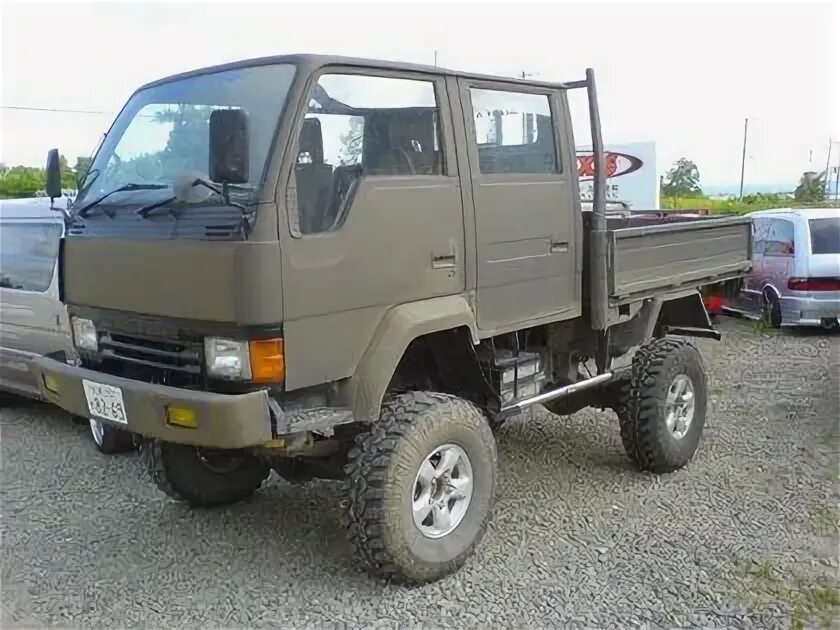 Грузовики 4вд приморский край. Митсубиси Кантер двухкабинник 4х4. Toyota Dyna 4x4 двухкабинник. Митсубиси Кантер двухкабинник 4 ВД. Тойота Дюна грузовик 4x4.