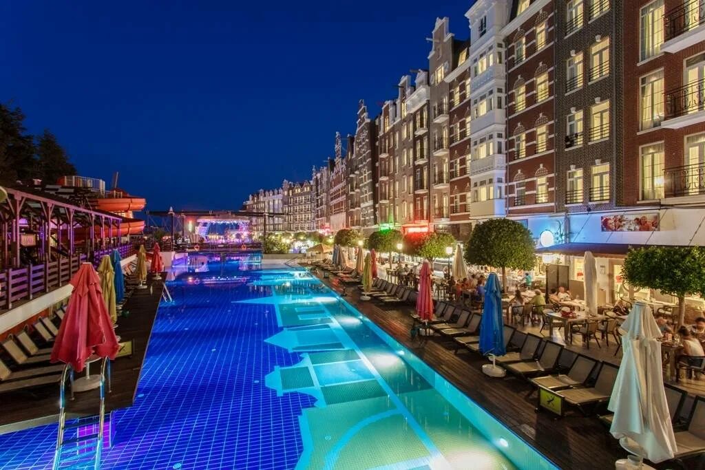 Orange county resort hotel kemer 5* турция, кемер. Отель оранж каунти кемер. Orange county kemer 5. Оранж кантри кемер отель. Оранж амстердам.