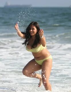 Shahs of Sunset star Mercedes Javid makes a splash spilling out of her neon...