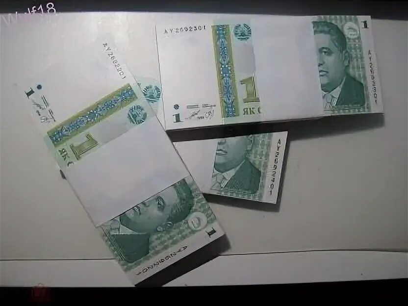 1000 рублей самоний. Деньги Таджикистана. Пачка денег Сомони. Таджикский Сомони. Купюры Таджикистана.