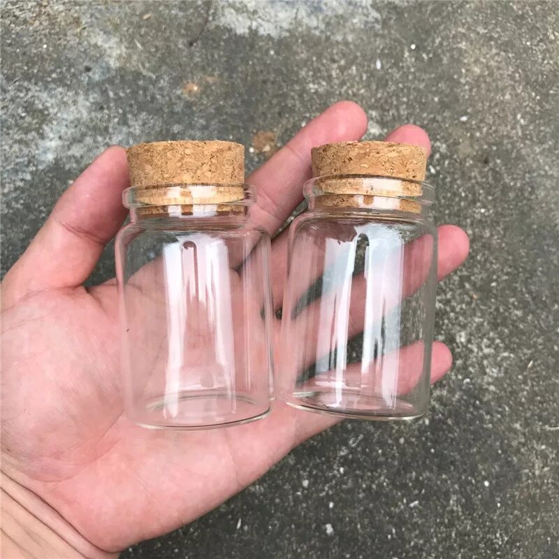 Как называются маленькие бутылочки. Маленькие стеклянные баночки. Маленькая стеклянная баночка. Стеклянная баночка с пробкой. Стеклянные бутылочки с пробкой.