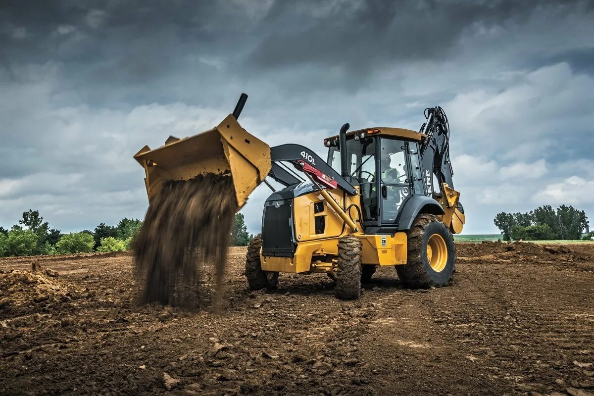 Включи трактора экскаватор. John Deere 1050k. Бульдозер John Deere 1050k. Джон Дир трактор погрузчик. John Deere экскаватор.