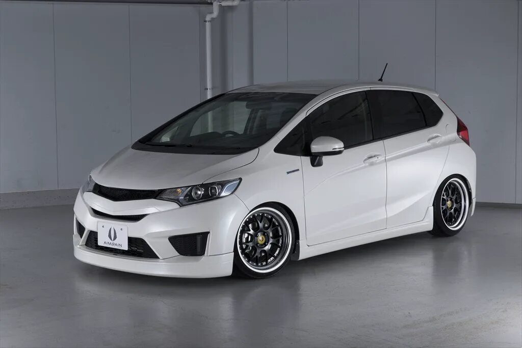 Honda gk. Honda Fit 2015 Tuning. Honda Fit 2014 Tuning. Honda Fit gp5 Tuning. Honda Fit 2015 обвес.