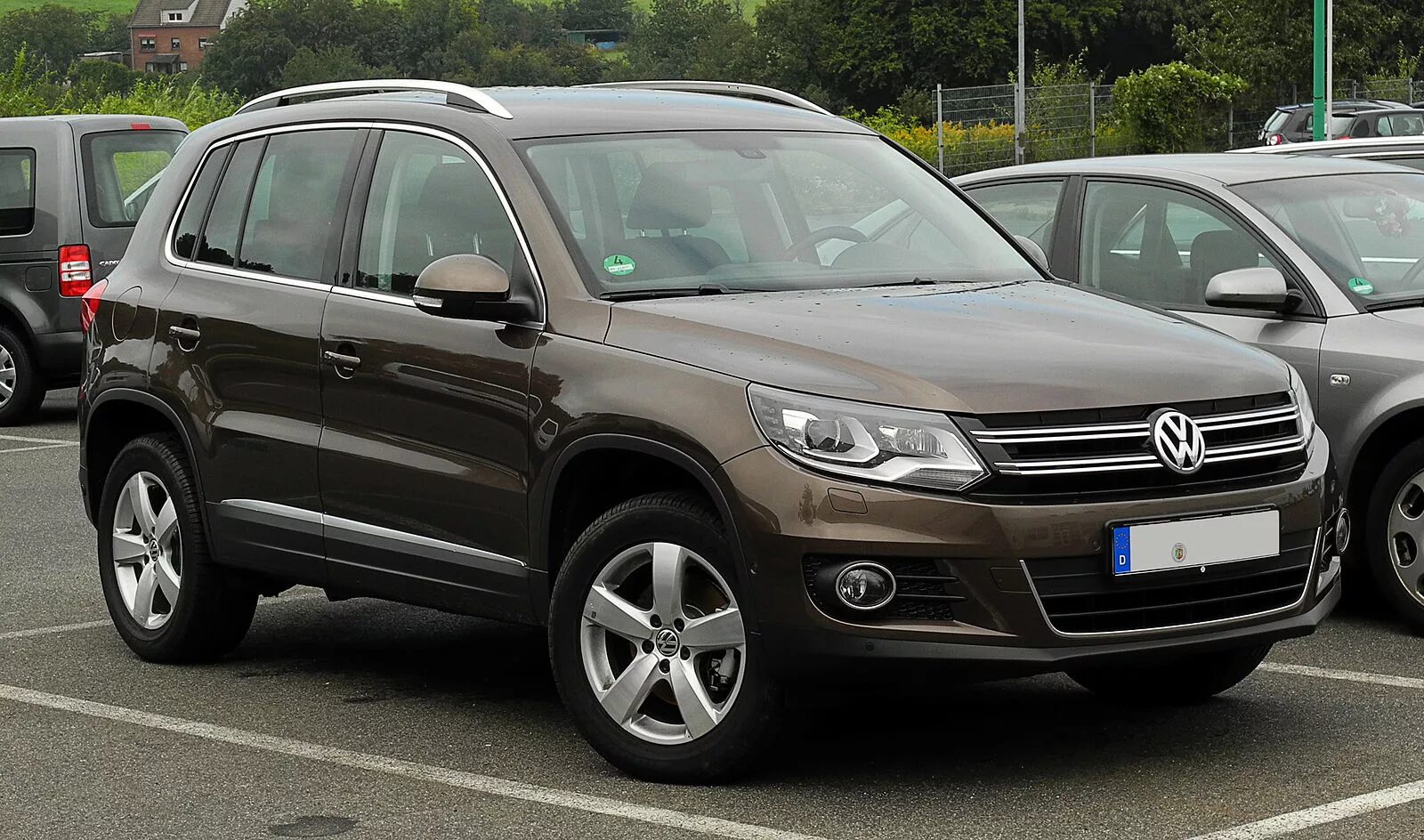 Volkswagen tiguan 2.0 tdi. Фольксваген Тигуан. Фольксваген Тигуан 1. Тигуан 2.0. VW Tiguan TDI 2011.