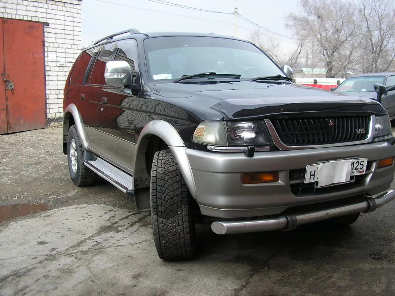 Mitsubishi Challenger 1997. Митсубиси Челленджер 1997. Мицубиси Паджеро спорт 1997. Mitsubishi Pajero Sport 1997.