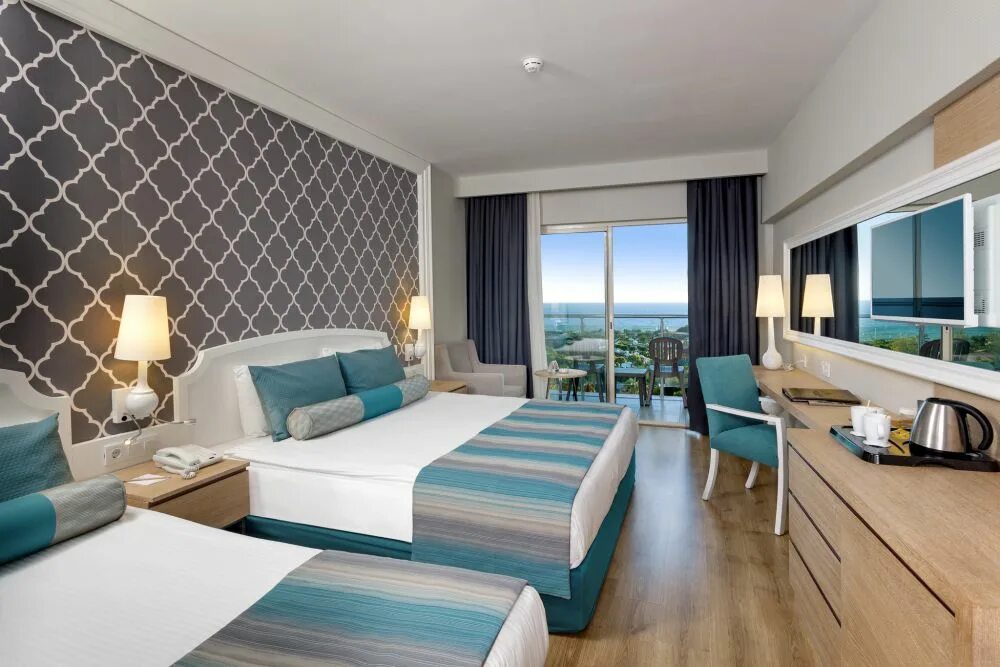 Делюкс рум это. Deluxe standard room. Титаник делюкс белек турция. Ramada plaza antalya 5. Сириус алания турция.